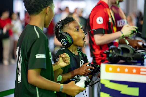 Soccer fans gather and compete at Mercedes-Benz Stadium for the ePremier Fan Festival on Saturday, Aug. 2, 2025. (Ben Hendren for the AJC)