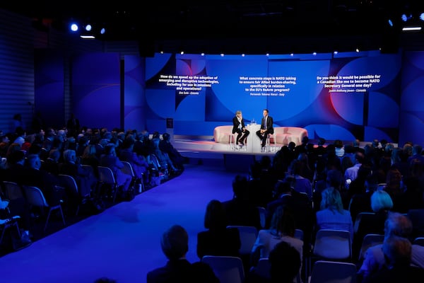 NATO Secretary General Mark Rutte, center right, addresses the audience at the NATO public forum on the sidelines of the NATO summit in The Hague, Netherlands, Tuesday, June 24, 2025. (AP Photo/Geert Vanden Wijngaert)