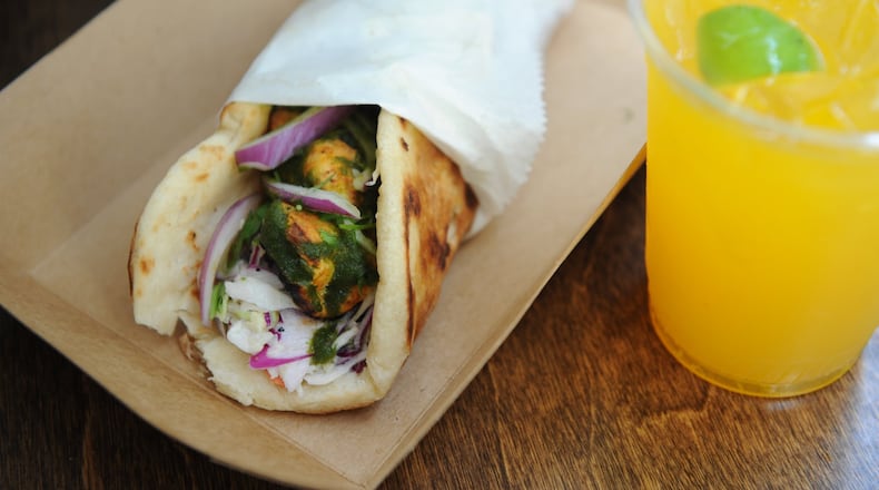 Chicken Tikka Roll with a Pineapple Turmeric Soda at Botiwalla. (Beckysteinphotography.com)
