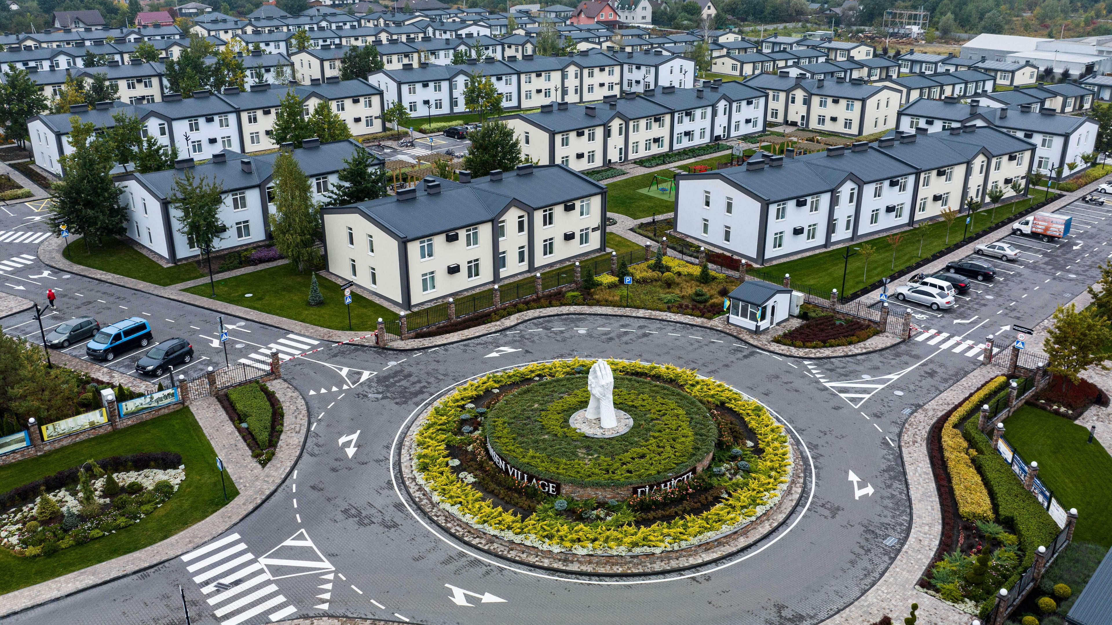 Hansen Village, a housing complex built for people who been displaced from occupied territories and separated from their families, is seen in Tarasivka, Ukraine, Thursday, Oct. 2, 2025. (AP Photo/Evgeniy Maloletka)
