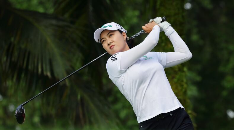 Minjee Lee of Australia tees off during the HSBC Women's World Championship at Sentosa Golf Club in Singapore, Thursday, Feb. 26, 2026. (AP Photo/Suhaimi Abdullah)