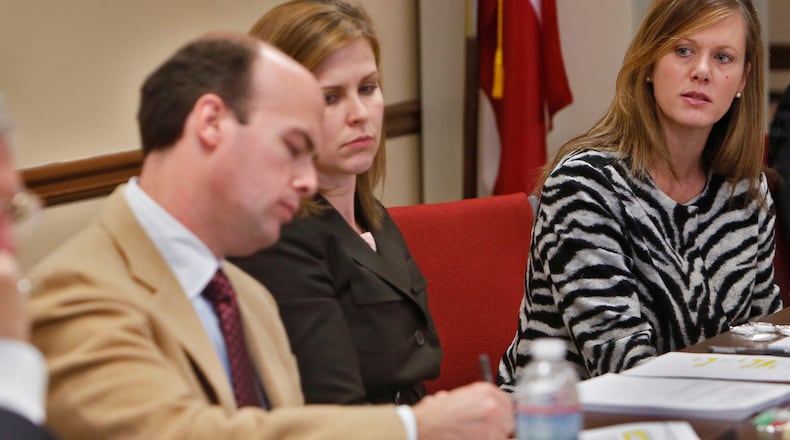 The state ethics commission took away Holly LaBerge's (far right) power to hire and fire personnel, giving it to themselves. From left are Dennis Cathey, Kevin Abernethy, and Hillary Stringfellow.