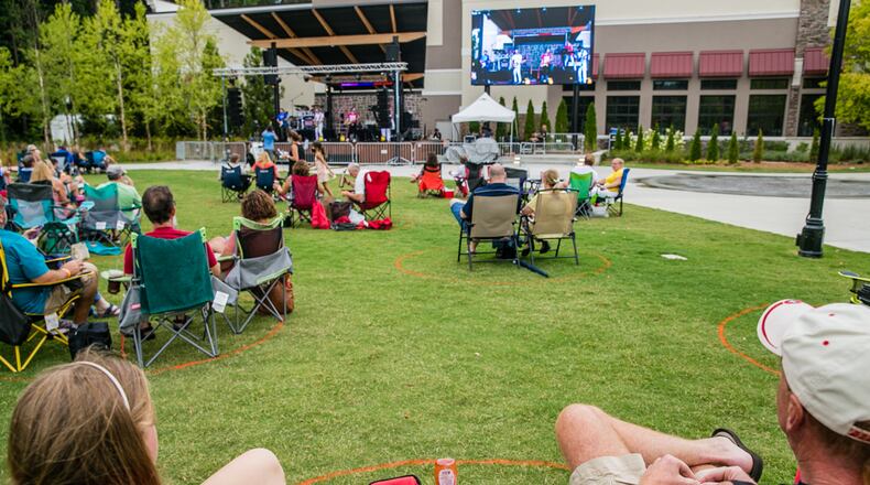 A 2020 concert held in the Town Green in Peachtree Corners. The Gwinnett city recently announced that it will expand its audience capacity for an upcoming concert. (Jenni Girtman for The Atlanta Journal-Constitution)