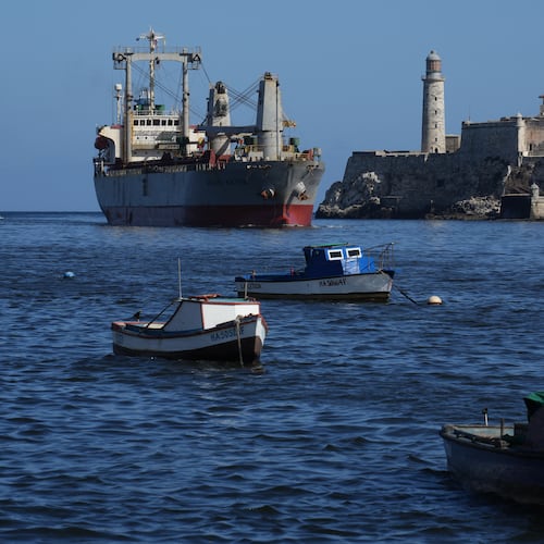 The Asian Katra cargo ship, top left, arrives in Havana Bay in Havana, Cuba, Monday, May 18, 2026. (AP Photo/Ramon Espinosa)