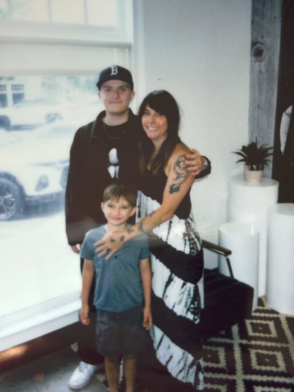 Ashley Mercurio, shown with her two sons, celebrated 18 years of sobriety in May. She is one of the authors who shares her story of addiction and recovery in "Young Firecrackers." (Courtesy of Ashley Mercurio)