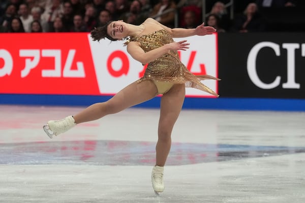 Alysa Liu, of the United States, performs during the women's free skating program at the figure skating world championships, Friday, March 28, 2025, in Boston. (AP Photo/Charles Krupa)