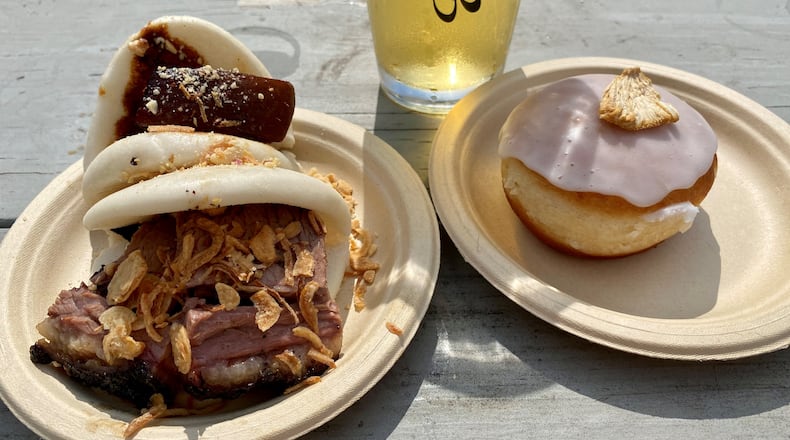At a recent popup at Eventide Brewing in Grant Park, Fu-Mao Sun’s Mighty Hans pop-up served baos, pineapple doughnuts and other Taiwanese bites. /
Wendell Brock for The Atlanta Journal-Constitution