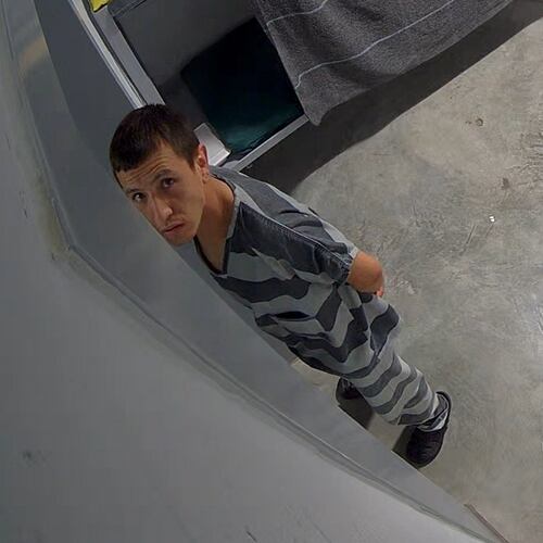 In this image from video provided by the Missouri State Highway Patrol, Immigration and Customs Enforcement detainee Brayan Rayo Garzon looks towards a surveillance camera in the Phelps County jail in Rolla, Mo., on April 7, 2025, shortly before he died by suicide. (Missouri State Highway Patrol via AP)