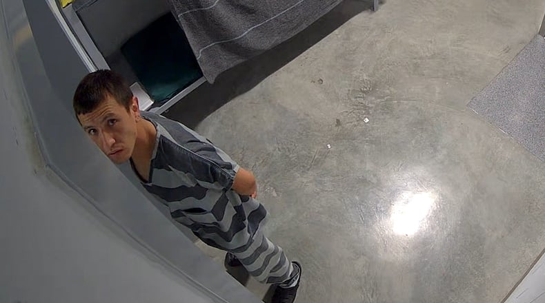 In this image from video provided by the Missouri State Highway Patrol, Immigration and Customs Enforcement detainee Brayan Rayo Garzon looks towards a surveillance camera in the Phelps County jail in Rolla, Mo., on April 7, 2025, shortly before he died by suicide. (Missouri State Highway Patrol via AP)