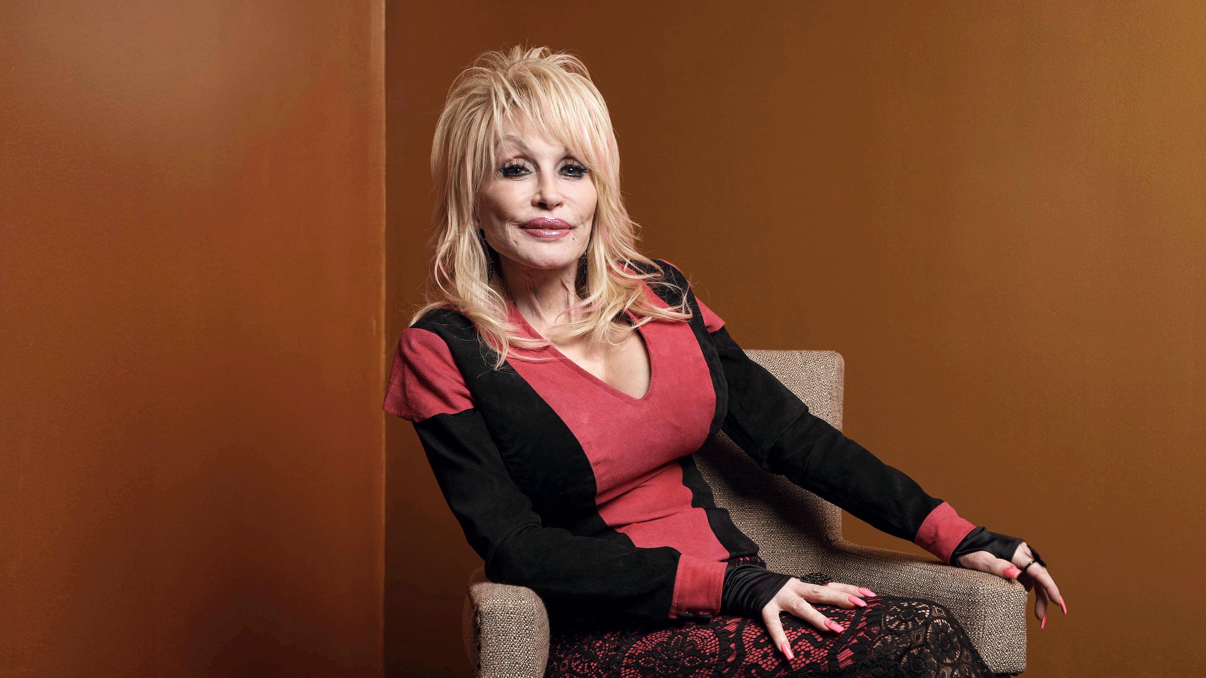 FILE - Dolly Parton poses at the Carnegie Medal of Philanthropy Ceremony in New York, on Oct. 13, 2022. (AP Photo/Andres Kudacki, File)