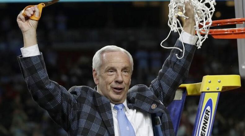 North Carolina head coach Roy Williams cuts down the net after the championship game against Gonzaga at the Final Four NCAA college basketball tournament, Monday, April 3, 2017, in Glendale, Ariz. North Carolina 71-65. (AP Photo/David J. Phillip)
