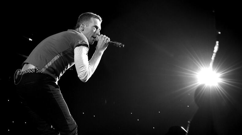 Singer Chris Martin of Coldplay performs at the Rose Bowl on August 20, 2016 in Pasadena, California.