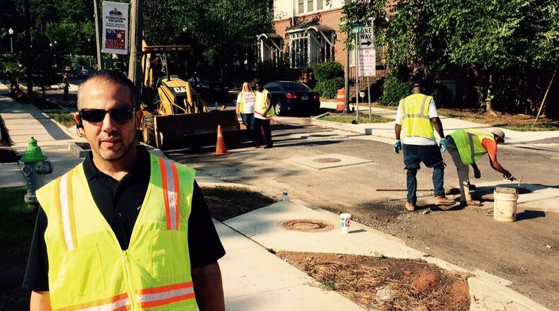 Contractor Alessandro Salvo jumped into a wet mess to help DeKalb County fix a huge water spill. But, he says, no good deed goes unpunished. Bill Torpy/AJC photo