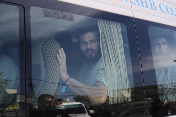 Freed Palestinian prisoners, who were detain by the Israeli army during its ground operation in the Gaza Strip, arrive at al-Aqsa Hospital in Deir al-Balah, central Gaza, after their release from an Israeli prison, Tuesday, April 29, 2025. (AP Photo/Abdel Kareem Hana)