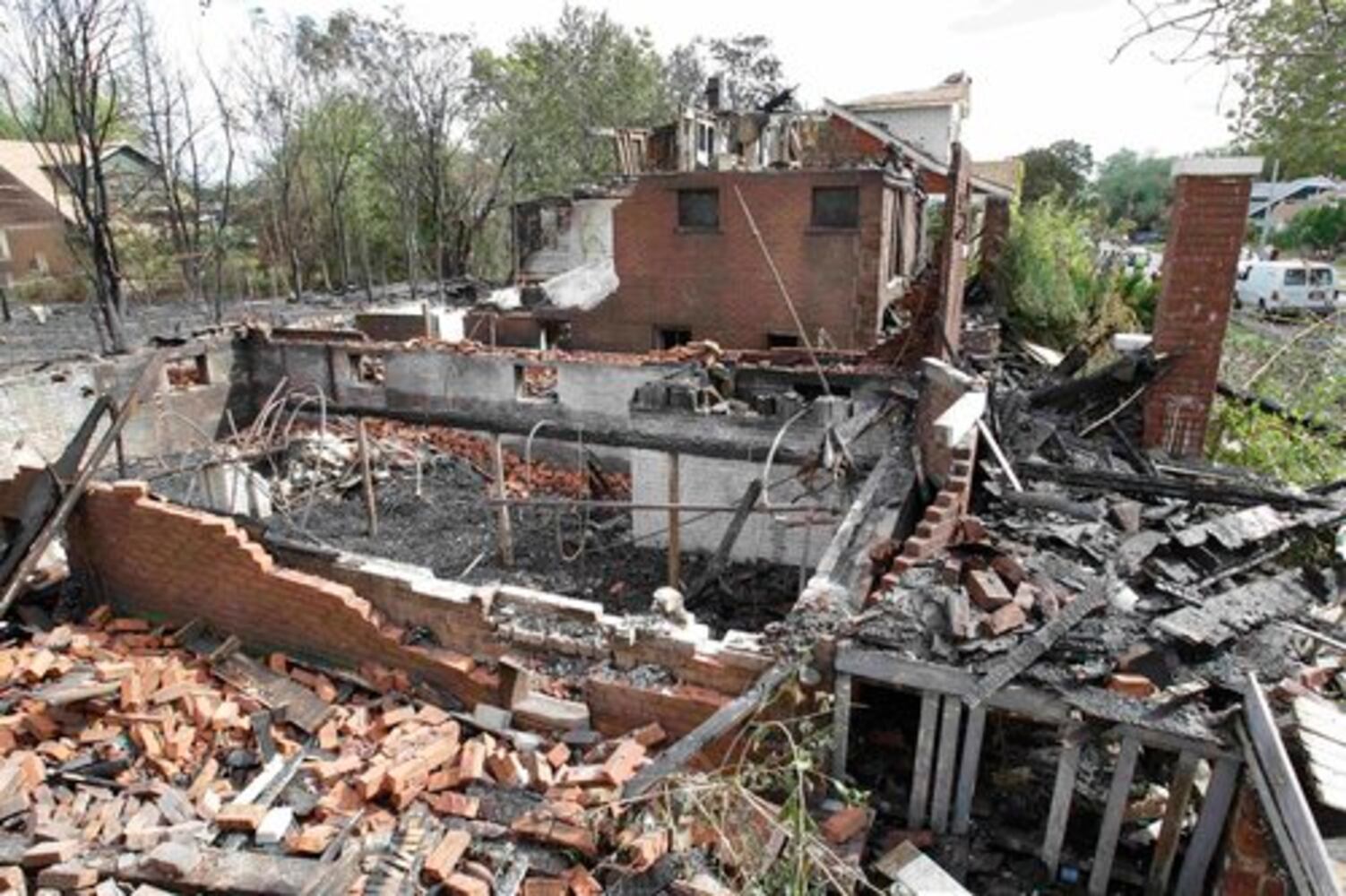 Winds push fires through dozens of Detroit homes