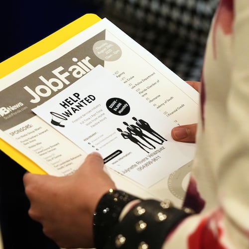 FILE - A job seeker waits to talk to a recruiter at a job fair Aug. 28, 2025, in Sunrise, Fla. (AP Photo/Marta Lavandier, File)
