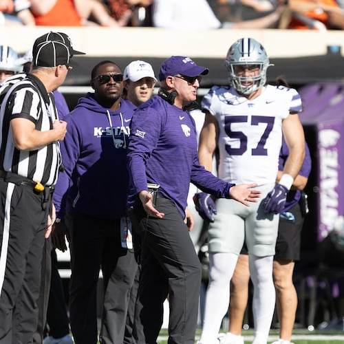 Kansas State head coach Chris Klieman talks to officials on the sidelines in the first half of an NCAA college football game against Oklahoma State Saturday, Nov. 15, 2025, in Stillwater, Okla. (AP Photo/Mitch Alcala)