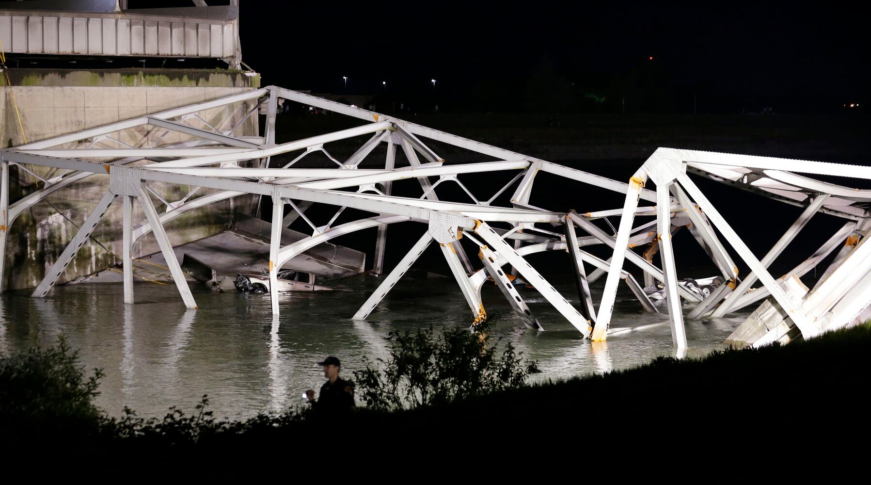 Vehicles, people dumped into water