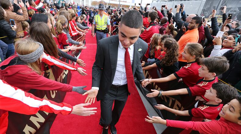 Nov 25, 2018 Atlanta: Atlanta United midfielder Miguel Almiron is greeted by fans along the red carpet arriving to play the New York Red Bulls in their Eastern Conference finals MLS soccer game on Sunday, Nov. 25, 2018, in Atlanta. Curtis Compton/ccompton@ajc.com