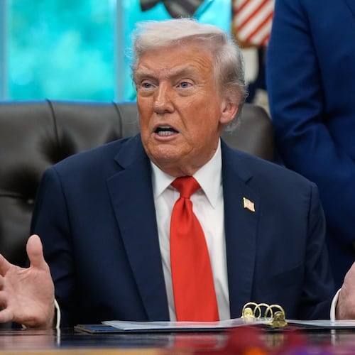 President Donald Trump answers questions from reporters during a Diwali celebration in the Oval Office at the White House, Tuesday, Oct. 21, 2025, in Washington. (AP Photo/Manuel Balce Ceneta)