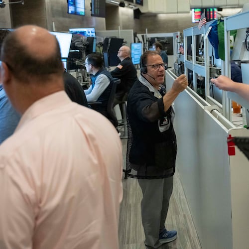 Options trader Anthony Spina works on the floor of the New York Stock Exchange, Thursday, Aug. 27, 2026, in New York. (AP Photo/Yuki Iwamura)