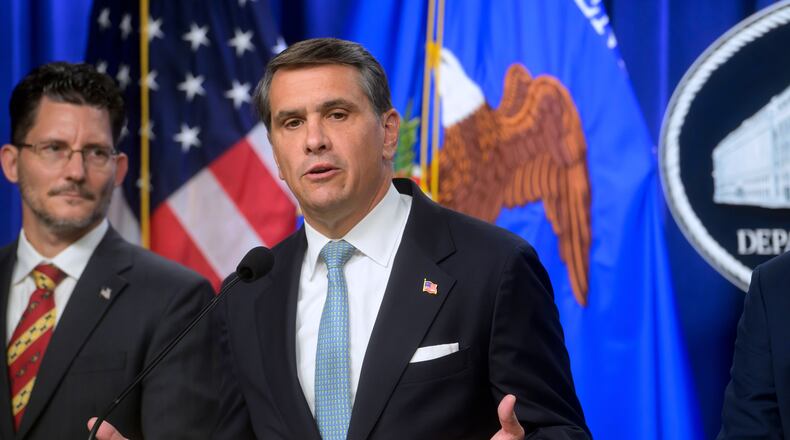 Acting Attorney General Todd Blanche, right, is joined by Deputy Assistant Secretary of the Department of State's Bureau of International Narcotics and Law Enforcement Affairs, Ambassador Michael C. Gonzales, left, during a news conference at the Department of Justice, Wednesday, August 5, 2026 in Washington. (AP Photo/Rod Lamkey, Jr.)