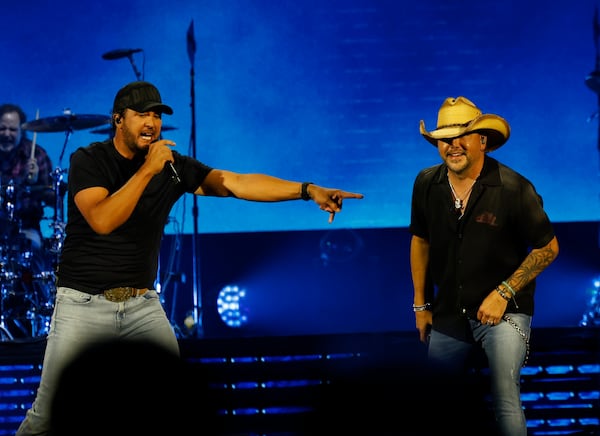 Georgia natives Jason Aldean (right) and Luke Bryan perform together for the first "Live Between the Hedges Concert Presented by PruittHealth" at Sanford Stadium. (Akili-Casundria Ramsess/EyeAkili Media)