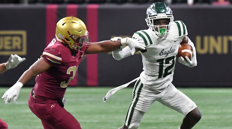 August 21, 2021 Atlanta - Collins HillÕs Travis Hunter (12) runs with the ball during the 2021 Corky Kell Classic on Saturday, August 21, 2021. (Hyosub Shin / Hyosub.Shin@ajc.com)