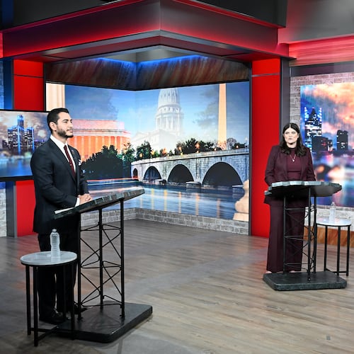 U.S. Senate candidates Abdul El-Sayed, left, and U.S. Rep. Haley Stevens participate in a televised debate, Monday, July 27, 2026, in Southfield, Mich. (Robin Buckson/Detroit News via AP, Pool)