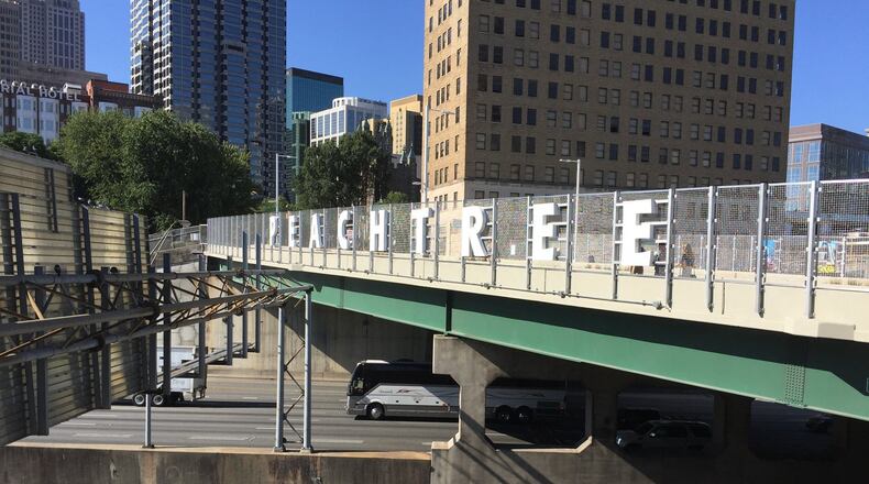 The “Peachtree” sign over the downtown Connector will make it easier for Interstate 75/85 travelers to identify Atlanta’s most famous thoroughfare from the road.