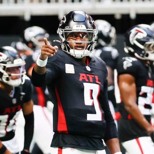 Atlanta Falcons quarterback Michael Penix Jr. (9) signals during warm-ups before the game against the Carolina Panthers at Mercedes-Benz Stadium on Sunday, Nov. 16, 2025, in Atlanta.
(Miguel Martinez/ AJC)