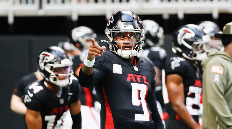 Atlanta Falcons quarterback Michael Penix Jr. (9) signals during warm-ups before the game against the Carolina Panthers at Mercedes-Benz Stadium on Sunday, Nov. 16, 2025, in Atlanta.
(Miguel Martinez/ AJC)
