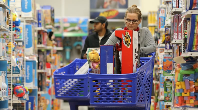 Nov. 27, 2015 - Atlanta - Roxanne Wilhelm shops on Black Friday morning at the Toys"R"Us store. BOB ANDRES / BANDRES@AJC.COM