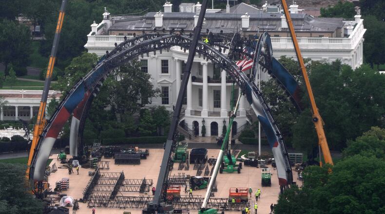 Equipment being placed on the South Lawn of the White House is seen from the Washington Monument, Tuesday, May 26, 2026, in Washington. The UFC is holding a mixed martial arts fight on June 14 as part of America 250 celebrations. (AP Photo/Mark Schiefelbein)