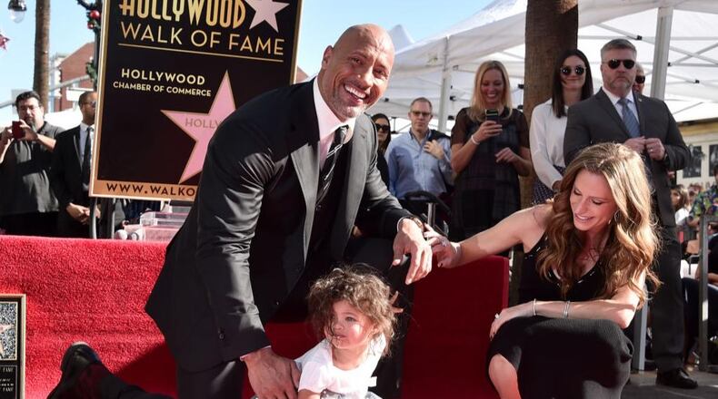 Actor Dwayne  "The Rock" Johnson, his daughter Jasmine and singer Lauren Hashian attend a ceremony when the actor received a star on the Hollywood Walk of Fame.