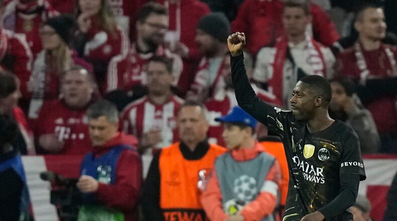PSG's Ousmane Dembele celebrates after scoring his sides first goal during the Champions League semifinal second leg soccer match between Bayern Munich and Paris Saint Germain in Munich, Germany, Wednesday, May 6, 2026. (AP Photo/Matthias Schrader)