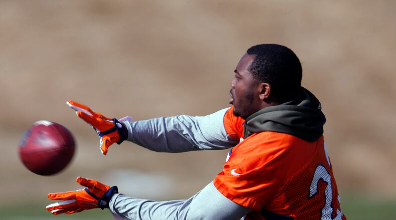 Denver Broncos running back C.J. Anderson catches a pass during an NFL football practice at the team's headquarters Saturday, Jan. 30, 2016, in Englewood, Colo. The Broncos are preparing to face the Carolina Panthers in Super Bowl 50 on Sunday, Feb. 7, in Santa Clara, Calif. (AP Photo/David Zalubowski)