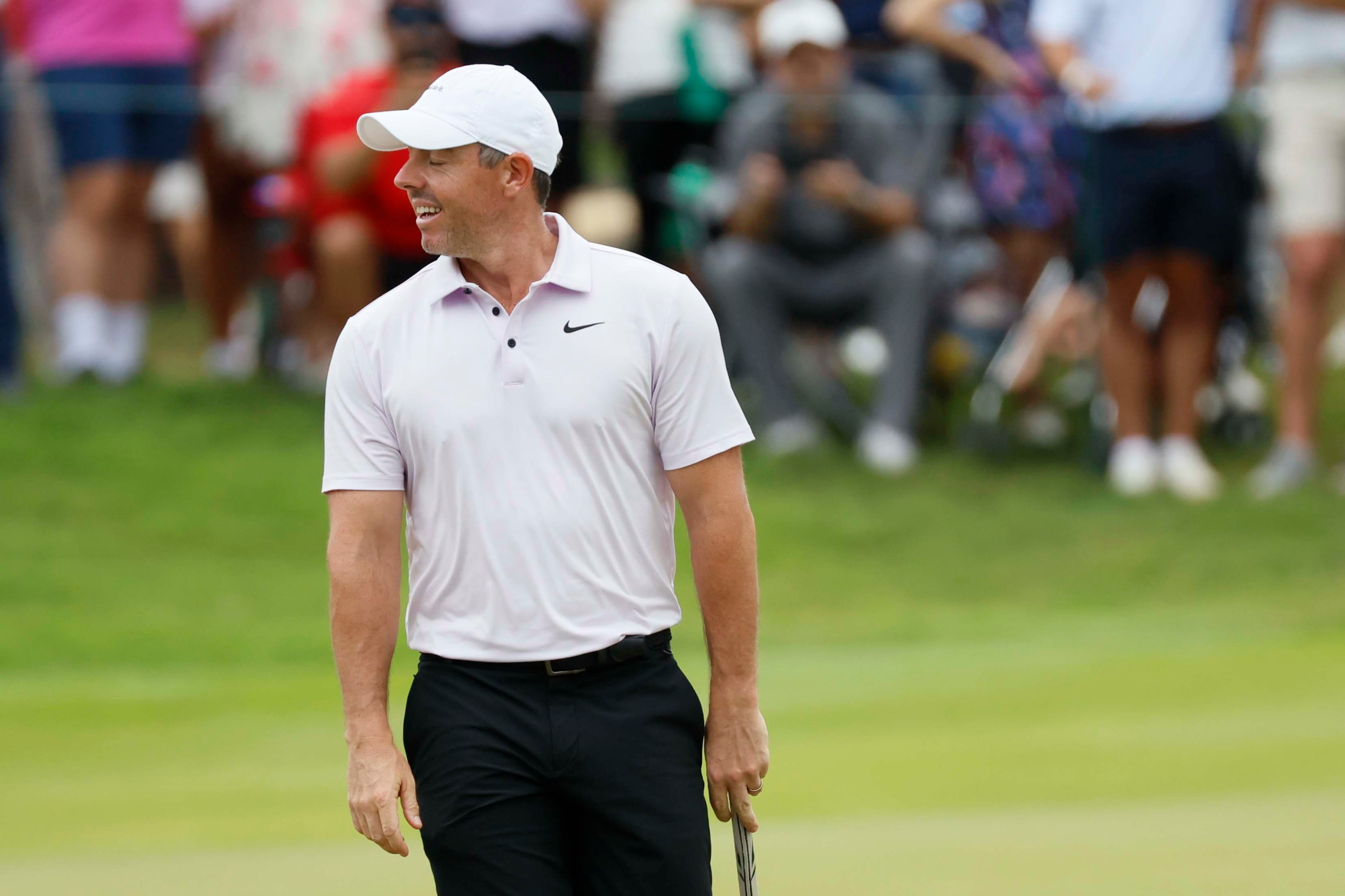 Rory McIlroy, of Northern Ireland, reacts after missing a putt on the first hole during the final round of the PGA Tour Championship at East Lake Golf Club, on Sunday, Aug. 24, 2025, in Atlanta. (Miguel Martinez/ AJC)