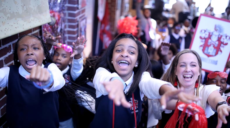 On the first day of school, Ron Clark Academy students do a ritual called wheel sorting, similar to the sorting hat in "Harry Potter" that determines which house they join. Ron Clark students from the house of Amistad are shouting their house chants, hoping that new students will be “sorted” into their house. (Courtesy photo)