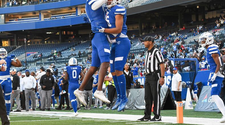 Georgia State wide receiver Sam Pinckney (right) celebrates a touchdown pass with a teammate in a game against Troy at Center Parc Stadium on Nov. 27, 2021. (Photo by Todd Drexler/Sideline Sports)
