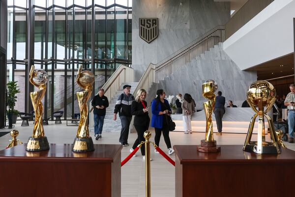 Visitors tour the Arthur M. Blank U.S. Soccer National Training Center during the opening ceremony in Fayetteville on Thursday. (Arvin Temkar/AJC)