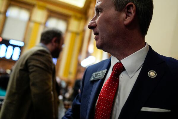Sen. John Albers walks on the Senate floor inside the state capitol, Thursday, March 6, 2025, in Atlanta. (AP Photo/Mike Stewart)