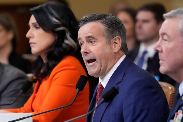 CIA Director John Ratcliffe, flanked by Director of National Intelligence Tulsi Gabbard, left, and Defense Intelligence Agency Director Jeffrey Kruse, testifies as the House Intelligence Committee holds a hearing on worldwide threats, at the Capitol, in Washington, Wednesday, March 26, 2025. (AP Photo/J. Scott Applewhite)