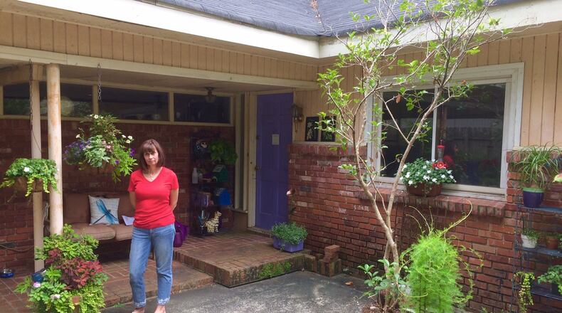 Hilda Brucker was cited for chipped paint and a crumbling driveway in Doraville and ended up on probation. Then she fought back. Photo by Bill Torpy