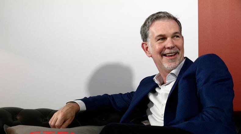 FILE - Netflix founder and CEO Reed Hastings smiles during an interview in Barcelona, Spain, Feb. 28, 2017. (AP Photo/Manu Fernandez, File)
