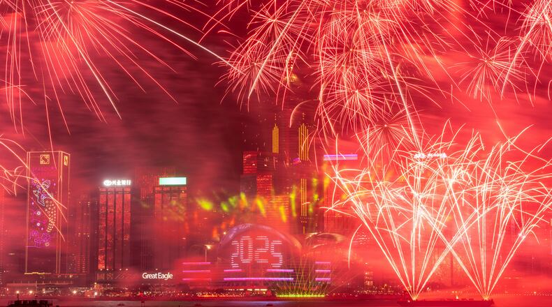 FILE - Fireworks explode over Victoria Harbour to celebrate the start of 2025 at Tsim Sha Tsui in Hong Kong, Jan. 1, 2025. (AP Photo/Chan Long Hei, File)