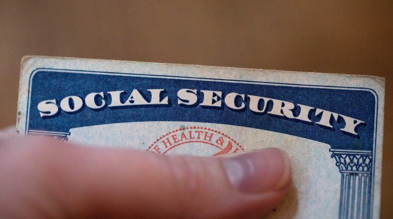 FILE - A Social Security card is displayed on Oct. 12, 2021, in Tigard, Ore. (AP Photo/Jenny Kane, File)