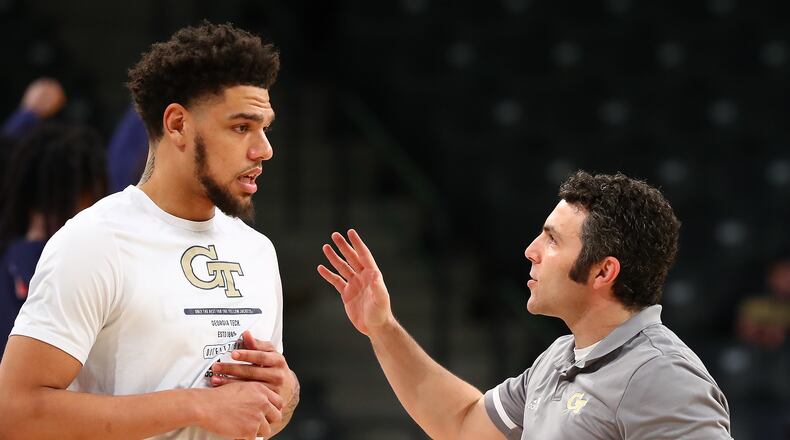 012322 Atlanta: Georgia Tech head coach Josh Pastner coaches up center Rodney Howard against Clayton State in a NCAA college basketball game on Sunday, Jan. 23, 2022, in Atlanta.   “Curtis Compton / Curtis.Compton@ajc.com”`