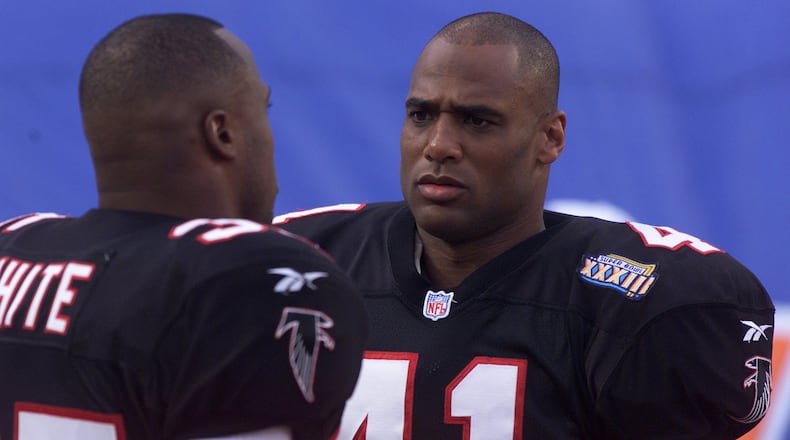 Eugene Robinson on the field prior to Super Bowl XXXIII in Miami in 1999. (AJC file photo)