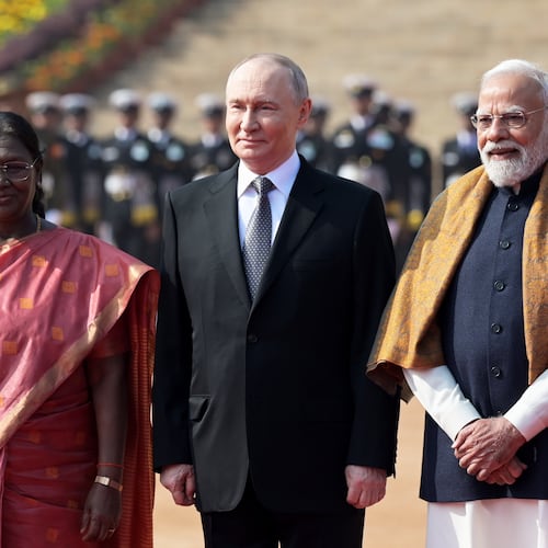 Russian President Vladimir Putin, center, poses for a photograph with Indian Prime Minister Narendra Modi, right, and Indian President Droupadi Murmu during a ceremonial reception at the Rashtrapati Bhavan in New Delhi, India, Friday, Dec. 5, 2025. (AP Photo)